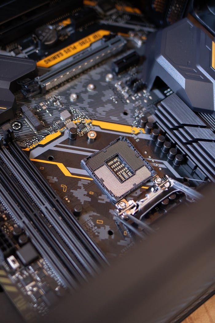 services-01 Detailed view of a computer motherboard highlighting electronic components and technology connections.